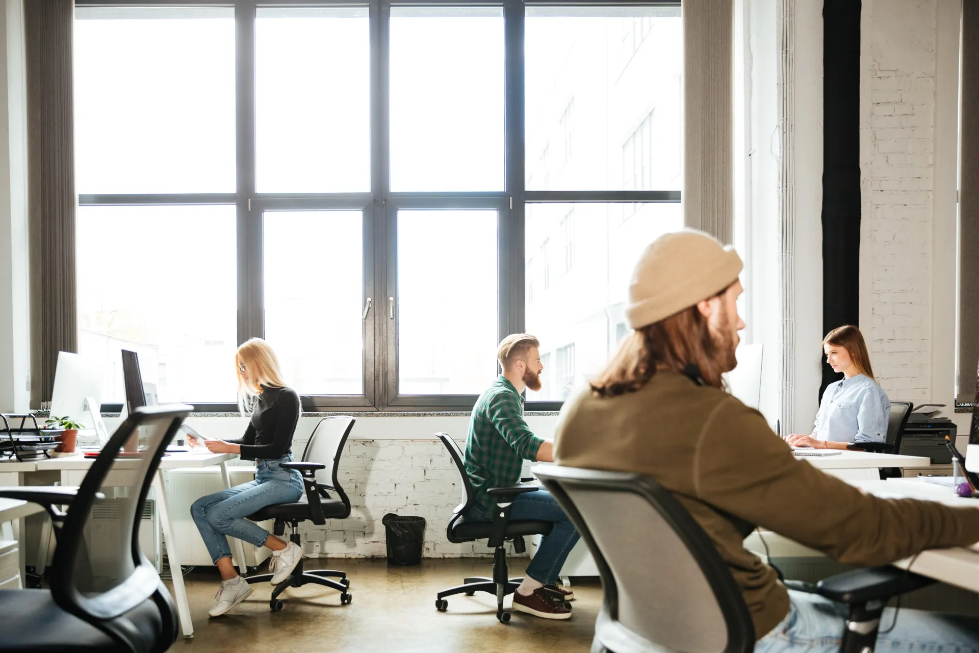 Team collaborating in a modern coworking space