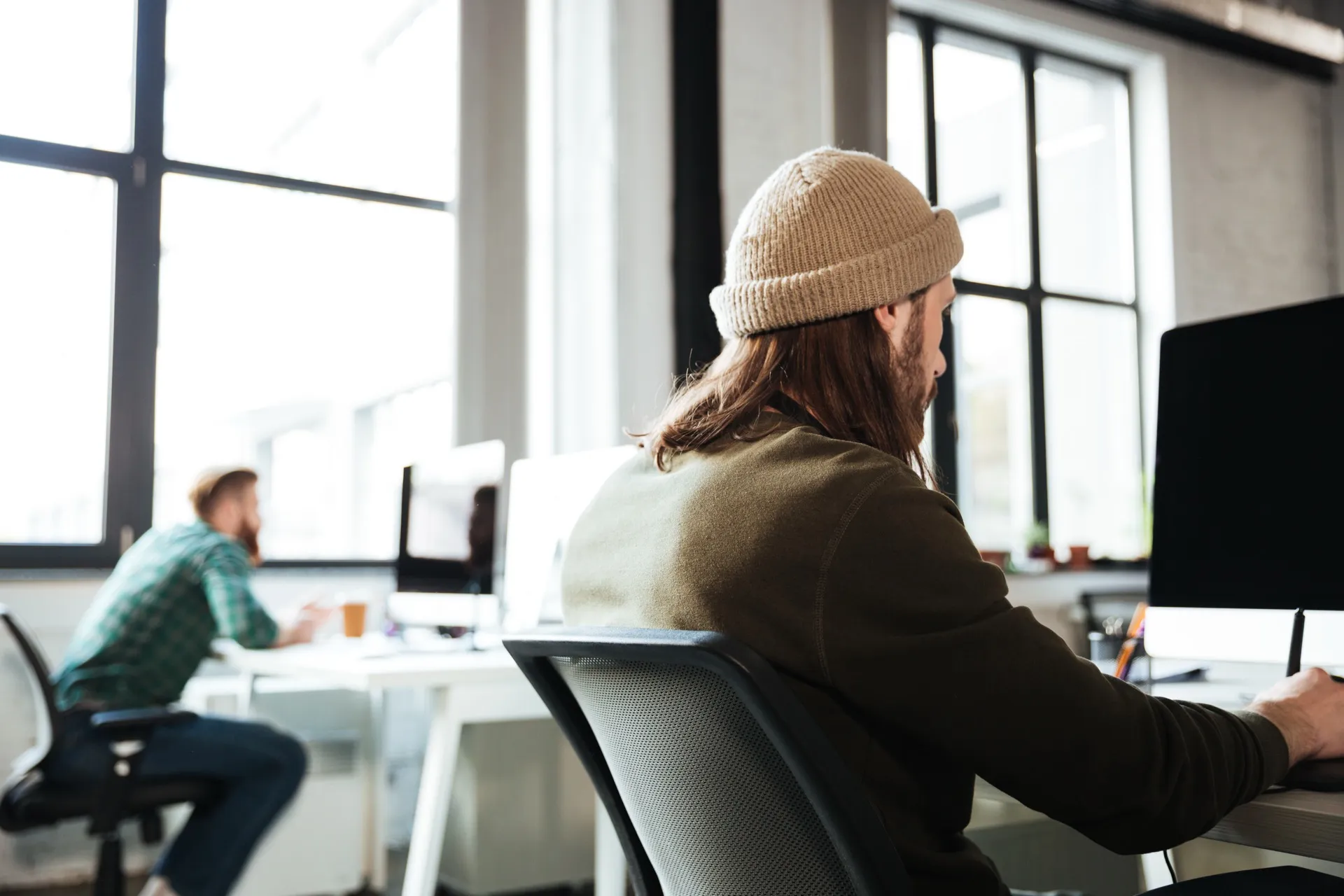 Focused worker in a modern coworking space